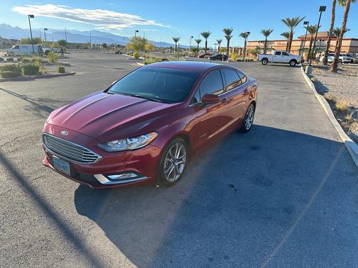 Red 2017 Ford Fusion Hybrid SE