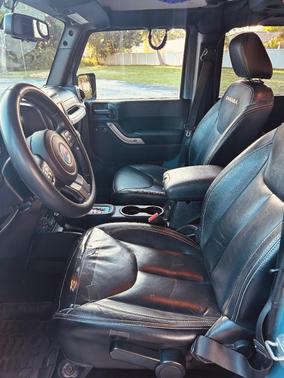 Gray 2015 Jeep Wrangler Unlimited Sahara