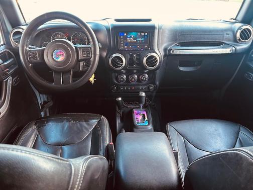 Gray 2015 Jeep Wrangler Unlimited Sahara
