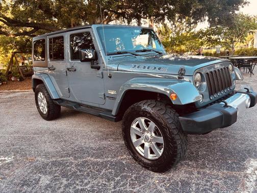 Gray 2015 Jeep Wrangler Unlimited Sahara