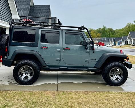 Gray 2014 Jeep Wrangler Unlimited Sport