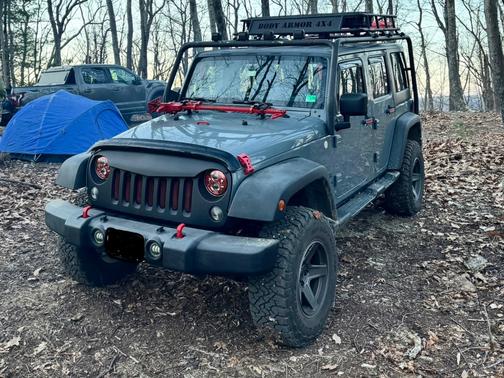 Gray 2014 Jeep Wrangler Unlimited Sport