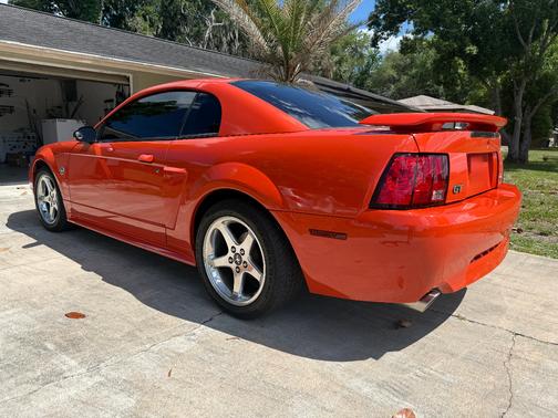 Orange 2004 Ford Mustang GT
