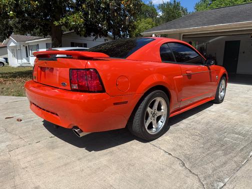 Orange 2004 Ford Mustang GT
