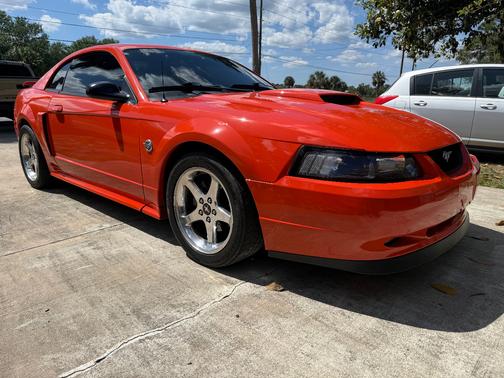 Orange 2004 Ford Mustang GT
