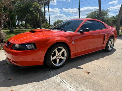 Orange 2004 Ford Mustang GT