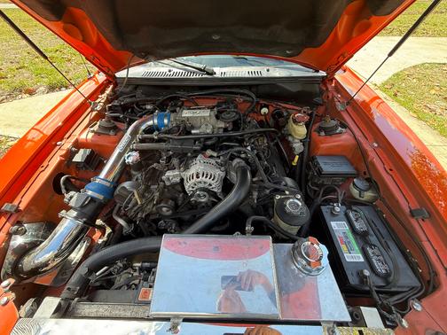 Orange 2004 Ford Mustang GT