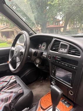Silver 2003 Nissan Pathfinder LE