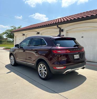 Red 2017 Lincoln MKC Select