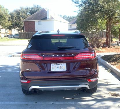 Red 2017 Lincoln MKC Select