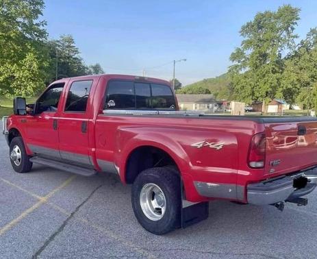 Red 2003 Ford F-350 Lariat Crew Cab Super Duty DRW