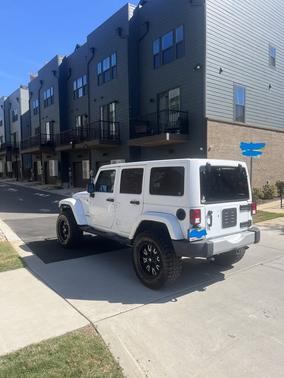 White 2013 Jeep Wrangler Unlimited Sahara