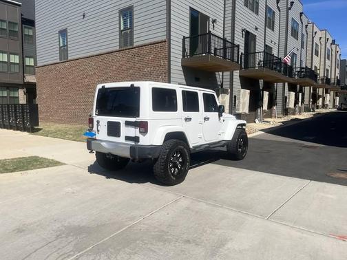 White 2013 Jeep Wrangler Unlimited Sahara
