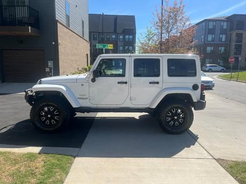 White 2013 Jeep Wrangler Unlimited Sahara