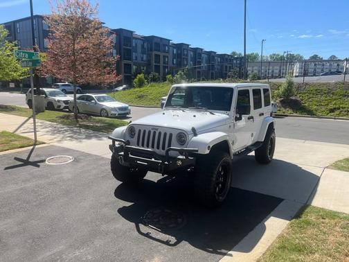 White 2013 Jeep Wrangler Unlimited Sahara