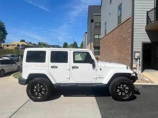 White 2013 Jeep Wrangler Unlimited Sahara