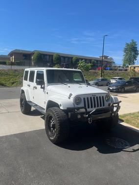 White 2013 Jeep Wrangler Unlimited Sahara