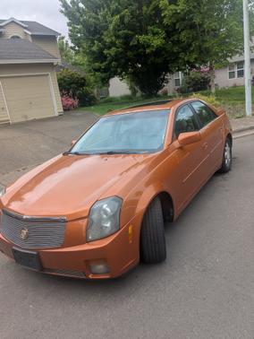 Orange 2003 Cadillac CTS Base