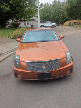 Orange 2003 Cadillac CTS Base