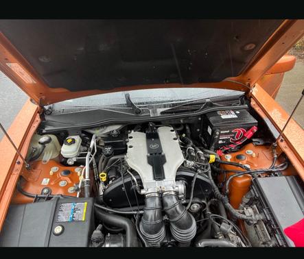 Orange 2003 Cadillac CTS Base
