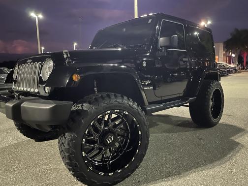 Photo 1 of 14 of 2017 Jeep Wrangler Sahara