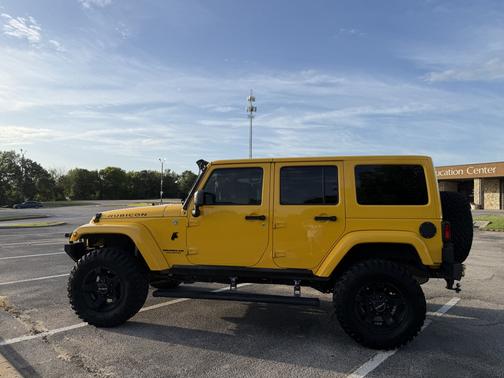 Yellow 2015 Jeep Wrangler Unlimited Rubicon