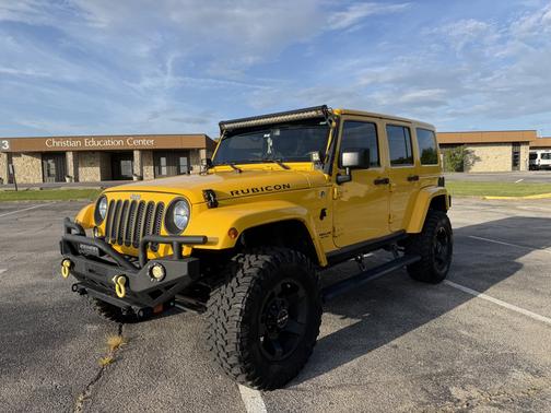 Yellow 2015 Jeep Wrangler Unlimited Rubicon