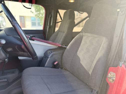 Red 2005 Jeep Wrangler Unlimited Rubicon