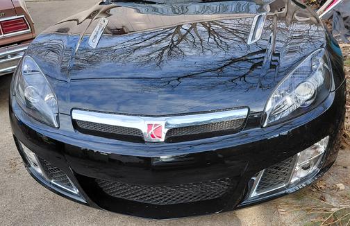 Black 2009 Saturn Sky Red Line
