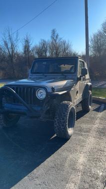 Gold 2004 Jeep Wrangler Sport