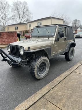 Gold 2004 Jeep Wrangler Sport