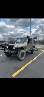 Gold 2004 Jeep Wrangler Sport