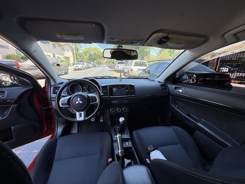 Red 2015 Mitsubishi Lancer Evolution GSR