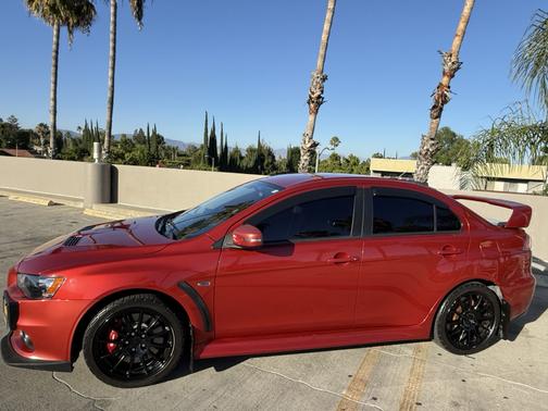 Red 2015 Mitsubishi Lancer Evolution GSR