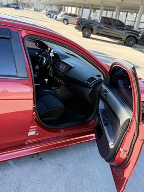 Red 2015 Mitsubishi Lancer Evolution GSR