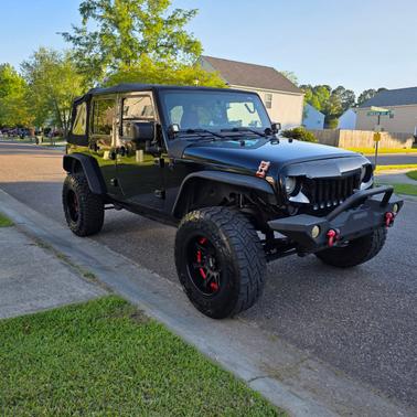 Black 2015 Jeep Wrangler Unlimited Sport