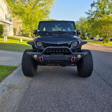 Black 2015 Jeep Wrangler Unlimited Sport