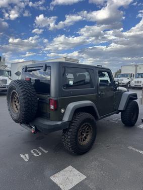 Green 2015 Jeep Wrangler Willys Wheeler