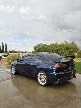 Blue 2014 Mitsubishi Lancer Evolution GSR