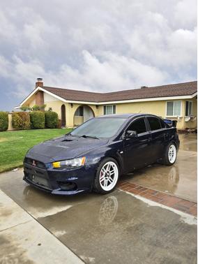 Blue 2014 Mitsubishi Lancer Evolution GSR