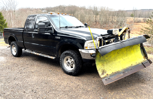 Black 2003 Ford F-250 XLT SuperCab Super Duty