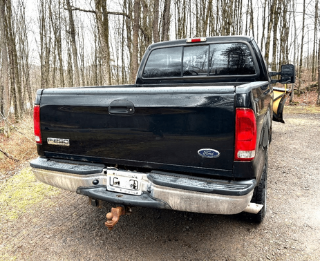 Black 2003 Ford F-250 XLT SuperCab Super Duty