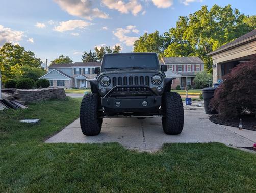 Green 2015 Jeep Wrangler Unlimited Sport