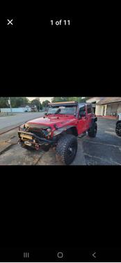 Red 2012 Jeep Wrangler Unlimited Sport
