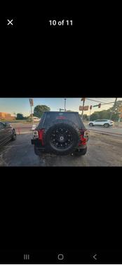 Red 2012 Jeep Wrangler Unlimited Sport