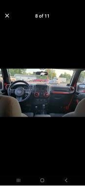 Red 2012 Jeep Wrangler Unlimited Sport