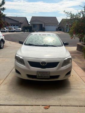 White 2010 Toyota Corolla LE
