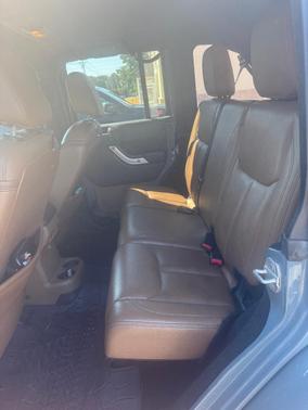 Gray 2014 Jeep Wrangler Unlimited Sahara
