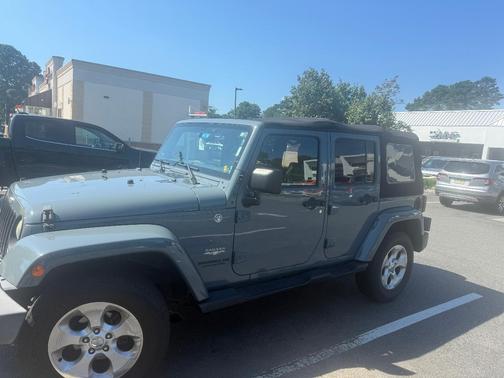 Gray 2014 Jeep Wrangler Unlimited Sahara