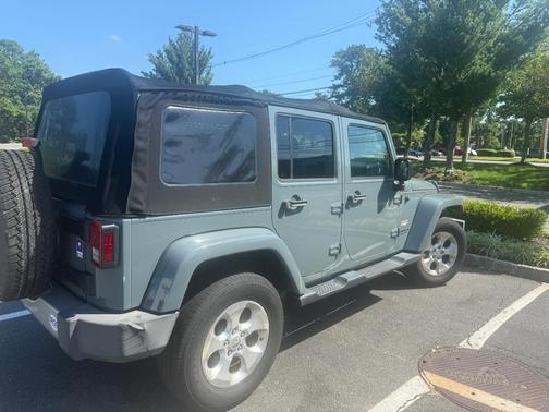 Gray 2014 Jeep Wrangler Unlimited Sahara